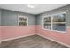 Bright bedroom with two windows and wood flooring at 4485 17Th W St, Bradenton, FL 34207