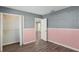 Bedroom with double door closet and wood flooring at 4485 17Th W St, Bradenton, FL 34207
