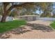 Landscaped front yard with brick paver driveway at 4485 17Th W St, Bradenton, FL 34207