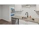 Kitchen with stainless steel dishwasher and granite countertops at 4485 17Th W St, Bradenton, FL 34207
