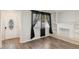 Living room with fireplace and wood flooring at 4485 17Th W St, Bradenton, FL 34207