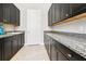 Bright laundry room with ample counter and cabinet space at 4745 Benito Ct, Lakewood Ranch, FL 34211