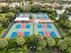 Expansive pickleball courts with shaded seating at 4745 Benito Ct, Lakewood Ranch, FL 34211