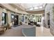 Spa reception area with seating and calming decor at 4745 Benito Ct, Lakewood Ranch, FL 34211