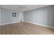 Light and airy bedroom with laminate flooring and ceiling fan at 4775 Cove Cir # 202, St Petersburg, FL 33708