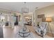 Grand foyer with elegant lighting, neutral color scheme, and arched entryways, offering a sophisticated welcome at 505 Sand Crane Ct, Bradenton, FL 34212