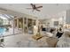 Open concept living room with a lanai view, connecting indoor and outdoor spaces seamlessly at 505 Sand Crane Ct, Bradenton, FL 34212
