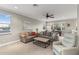 Comfortable living room with neutral tones, two sofas, and large windows providing ample natural light at 505 Sand Crane Ct, Bradenton, FL 34212