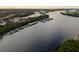 Aerial view of a waterfront community showcasing a marina with numerous boats docked along the waterway at 505 Sand Crane Ct, Bradenton, FL 34212