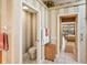 Bathroom with toilet and access to the main bedroom at 5112 White Ibis Dr, North Port, FL 34287