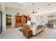 Bright and airy living room with high ceilings and built-in shelving at 5112 White Ibis Dr, North Port, FL 34287