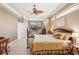 Spacious main bedroom with a king bed and large windows at 5112 White Ibis Dr, North Port, FL 34287