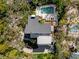 Aerial view showcasing home's design and pool area at 5235 Siesta Cove Dr, Sarasota, FL 34242