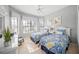 Guest bedroom with two twin beds and plenty of natural light at 531 Latitude Ln, Osprey, FL 34229