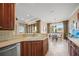 Kitchen features a breakfast nook, double sink, and opens to the living area at 531 Latitude Ln, Osprey, FL 34229