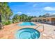 Community pool and spa with plenty of lounge chairs at 531 Latitude Ln, Osprey, FL 34229
