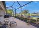 Enjoy the lake view from this tranquil screened patio at 531 Latitude Ln, Osprey, FL 34229