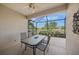 Relaxing screened patio overlooking a peaceful lake view at 531 Latitude Ln, Osprey, FL 34229
