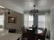 Charming dining space with glass-top table and wicker chairs at 5317 19Th S Ave, Gulfport, FL 33707