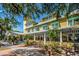 Grand hotel with large porch, lush landscaping, and sidewalk seating at 5317 19Th S Ave, Gulfport, FL 33707