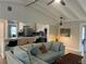 Open living area with sectional sofa and kitchen views at 5317 19Th S Ave, Gulfport, FL 33707