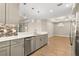 Modern kitchen with stainless steel appliances and gray cabinets at 5439 Taliaferro Ct, Palmetto, FL 34221