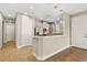 Modern kitchen with stainless steel appliances and gray cabinets at 5439 Taliaferro Ct, Palmetto, FL 34221