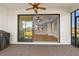 Covered lanai with paver floor and view of backyard at 5439 Taliaferro Ct, Palmetto, FL 34221