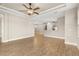 Open concept living area with kitchen island and tile floors at 5439 Taliaferro Ct, Palmetto, FL 34221