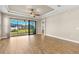 Open living area with sliding glass doors leading to a patio at 5439 Taliaferro Ct, Palmetto, FL 34221