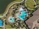 Resort-style pool with multiple areas for lounging and swimming at 5439 Taliaferro Ct, Palmetto, FL 34221