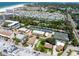 Aerial view showcasing tennis courts and community at 5916 Midnight Pass Rd # 103, Sarasota, FL 34242