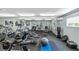 Community gym with a variety of exercise equipment at 5916 Midnight Pass Rd # 103, Sarasota, FL 34242