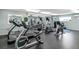 Community gym with various cardio and weight training equipment at 5916 Midnight Pass Rd # 103, Sarasota, FL 34242