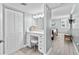 Vanity area with a makeup vanity and a walk-in closet at 5916 Midnight Pass Rd # 103, Sarasota, FL 34242