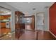 Open floorplan view of a formal dining room area with access to the kitchen and a bedroom area at 6805 13Th Avenue W Dr, Bradenton, FL 34209