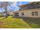 Private backyard showing home's exterior and landscaping at 7133 Cedar Hollow Cir # 22-102, Bradenton, FL 34203