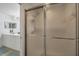 Bathroom with shower, vanity, and linen closet at 7133 Cedar Hollow Cir # 22-102, Bradenton, FL 34203