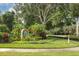 Attractive community entrance with landscaping and signage at 7133 Cedar Hollow Cir # 22-102, Bradenton, FL 34203