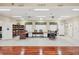 Community room with large table and library at 7133 Cedar Hollow Cir # 22-102, Bradenton, FL 34203