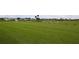 Driving range with multiple tee boxes and beautiful landscape at 7133 Cedar Hollow Cir # 22-102, Bradenton, FL 34203
