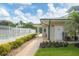 Community pool entrance with walkway and landscaping at 7133 Cedar Hollow Cir # 22-102, Bradenton, FL 34203