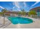 Inviting community pool area with plenty of seating at 7133 Cedar Hollow Cir # 22-102, Bradenton, FL 34203