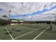 Well-maintained tennis courts with ample lighting and seating at 7133 Cedar Hollow Cir # 22-102, Bradenton, FL 34203