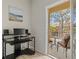 Intimate balcony featuring seating, with a view of the neighborhood at 7911 Moonstone Dr # 26-203, Sarasota, FL 34233