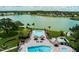 Aerial view of community pool area and lakefront property at 8520 Imperial Cir, Palmetto, FL 34221