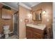 Bathroom with walk-in shower and vanity at 8520 Imperial Cir, Palmetto, FL 34221