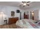 Bedroom with wood dresser and ensuite bath at 8520 Imperial Cir, Palmetto, FL 34221