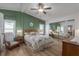 Bedroom with green accent wall and closet at 8520 Imperial Cir, Palmetto, FL 34221