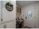 Entryway with built-in desk and storage at 8520 Imperial Cir, Palmetto, FL 34221